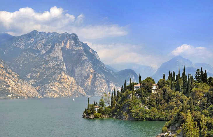 Lake Garda. Lake Garda is the largest lake in Italy. It is a popular holiday location in northern Italy, about halfway between Brescia and Verona, and between Venice